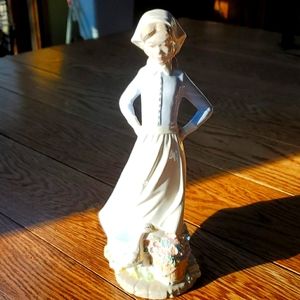 Girl with duck figurine, handmade ceramic.